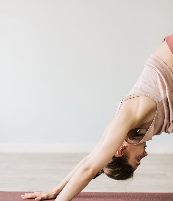 Woman in a calm yoga pose, embodying inner peace and strength.